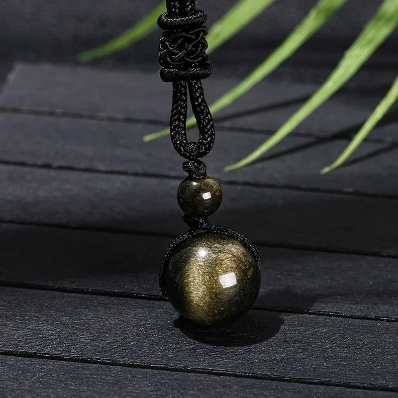 buy-your-new-pendentif-protection-abondance-en-obsidienne-doree-on-sale_2.webp