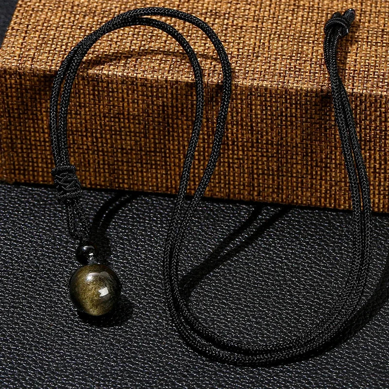 buy-your-new-pendentif-protection-abondance-en-obsidienne-doree-on-sale_4.webp
